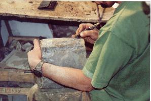 Preparing and preserving the giant ichthyosaur at Charmouth Fossils.